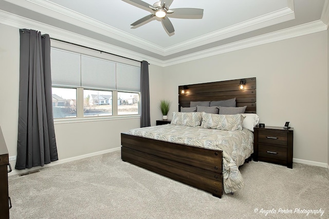 bedroom with baseboards, ornamental molding, and light carpet