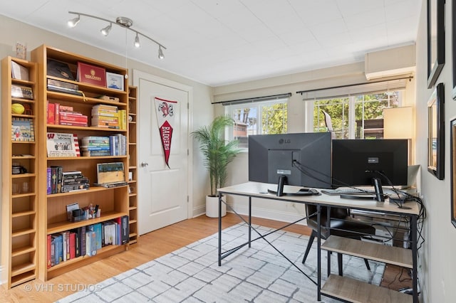 office area featuring wood finished floors and track lighting