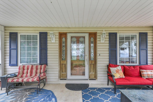 property entrance featuring covered porch