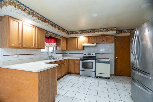 17246 Bernadine St, Lansing, IL 60438 - kitchen with light tile patterned floors, stainless steel appliances, under cabinet range hood, backsplash, and a sink