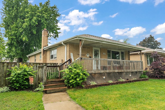 15058 Tripp Ave, Midlothian, IL 60445 - ranch-style house with a chimney and brick siding