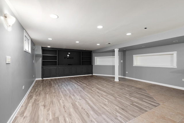 15058 Tripp Ave, Midlothian, IL 60445 - unfurnished living room featuring built in features, baseboards, recessed lighting, and light wood-style flooring