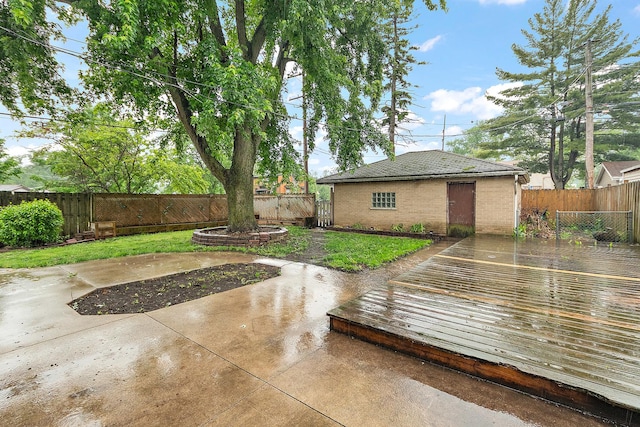 15058 Tripp Ave, Midlothian, IL 60445 - fenced backyard featuring a patio area and an outdoor structure