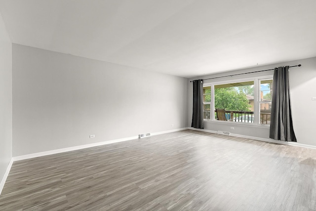 15058 Tripp Ave, Midlothian, IL 60445 - unfurnished room with wood finished floors and baseboards
