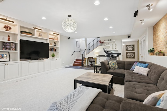 carpeted living room with recessed lighting, baseboards, and stairway