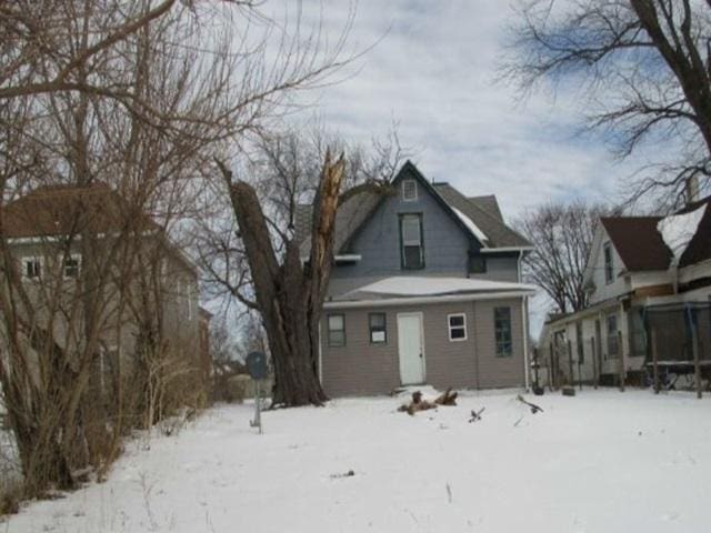 1207 S Main St, Paris, IL 61944 - view of snow covered rear of property