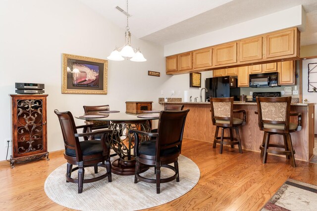 1103 Shingle Oak Ln Unit 3A, Rockford, IL 61107 - dining area with light wood-style floors and visible vents