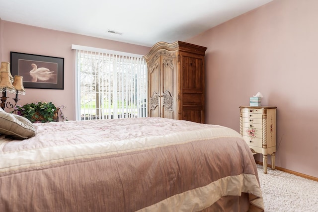1103 Shingle Oak Ln Unit 3A, Rockford, IL 61107 - bedroom featuring carpet flooring, visible vents, and baseboards