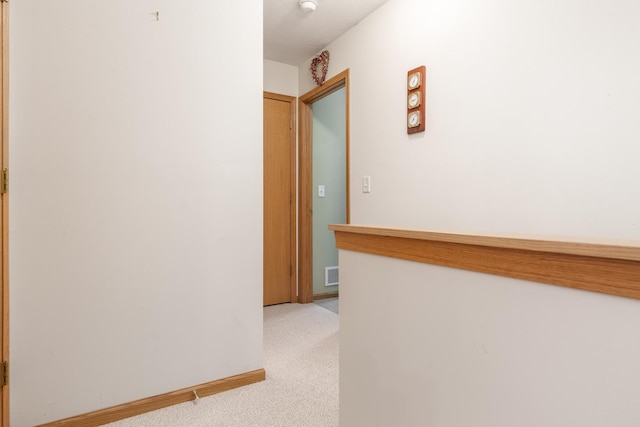 1103 Shingle Oak Ln Unit 3A, Rockford, IL 61107 - hallway with light colored carpet, visible vents, and baseboards