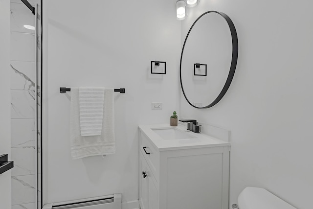 245 N Smith St Unit 2W, Palatine, IL 60067 - bathroom featuring a baseboard heating unit, toilet, a shower, and vanity