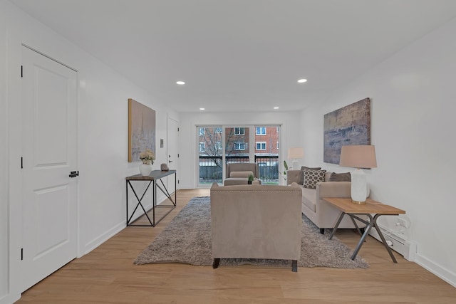 245 N Smith St Unit 2W, Palatine, IL 60067 - living room with recessed lighting, baseboards, and light wood-type flooring
