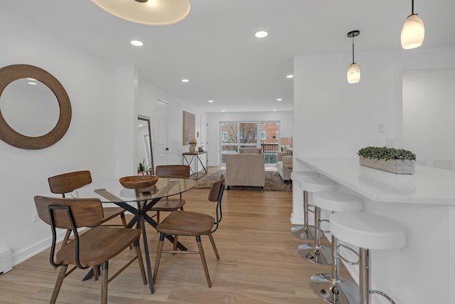 245 N Smith St Unit 2W, Palatine, IL 60067 - dining area featuring recessed lighting, light wood finished floors, and baseboards