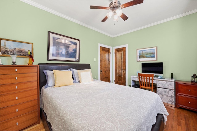 3924 W 64th Pl, Chicago, IL 60629 - bedroom with ornamental molding, wood finished floors, and ceiling fan