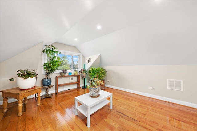 3924 W 64th Pl, Chicago, IL 60629 - sitting room with light wood-style floors, baseboards, lofted ceiling, and recessed lighting