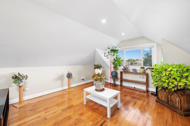 3924 W 64th Pl, Chicago, IL 60629 - bonus room featuring vaulted ceiling, light wood-style flooring, baseboards, and recessed lighting