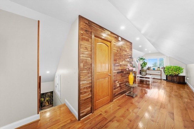 3924 W 64th Pl, Chicago, IL 60629 - bonus room featuring light wood-style flooring, vaulted ceiling, baseboards, and recessed lighting