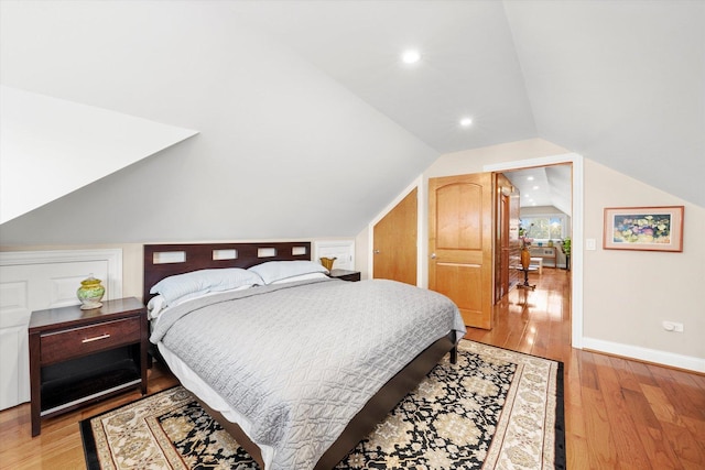 3924 W 64th Pl, Chicago, IL 60629 - bedroom with lofted ceiling, light wood-type flooring, baseboards, and recessed lighting