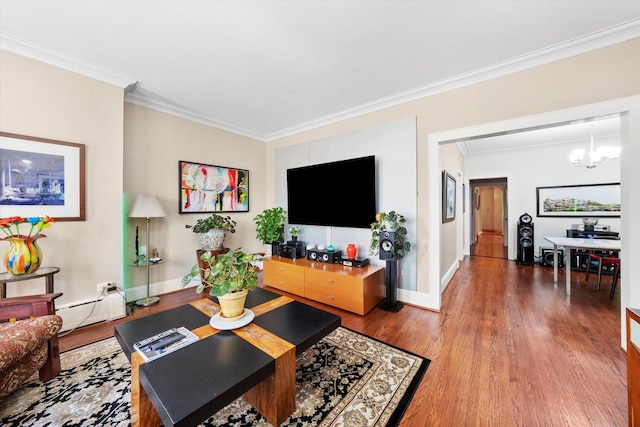 3924 W 64th Pl, Chicago, IL 60629 - living room with ornamental molding, wood finished floors, baseboards, a baseboard heating unit, and a chandelier