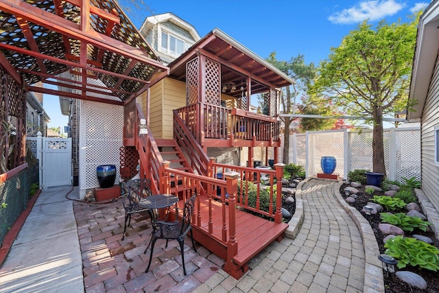 3924 W 64th Pl, Chicago, IL 60629 - view of patio with a wooden deck, a fenced backyard, and stairway