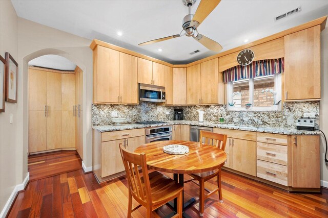 3924 W 64th Pl, Chicago, IL 60629 - kitchen featuring light brown cabinets, appliances with stainless steel finishes, ceiling fan, light wood-style flooring, and recessed lighting