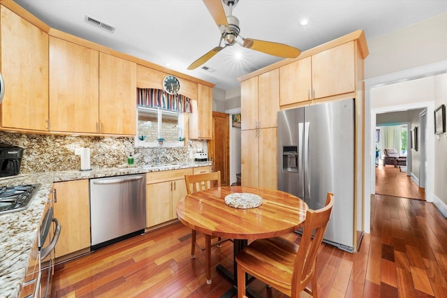 3924 W 64th Pl, Chicago, IL 60629 - kitchen with stainless steel appliances, light brown cabinets, light wood-style flooring, ceiling fan, and recessed lighting