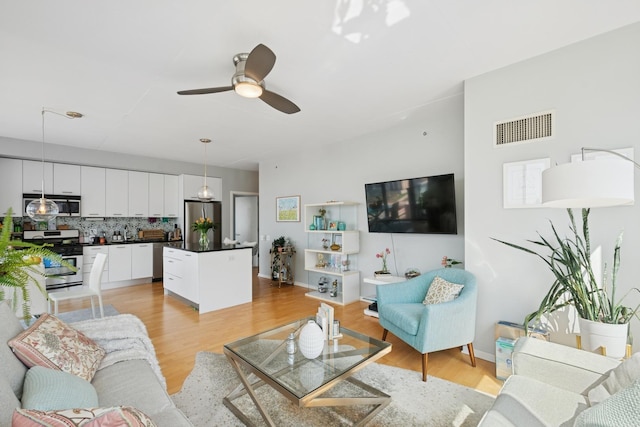 659 W Randolph St Unit 1720, Chicago, IL 60661 - living room with light wood-style floors and a ceiling fan
