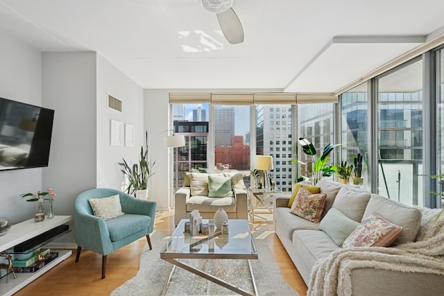 659 W Randolph St Unit 1720, Chicago, IL 60661 - living room featuring wood finished floors, ceiling fan, expansive windows, and a view of city