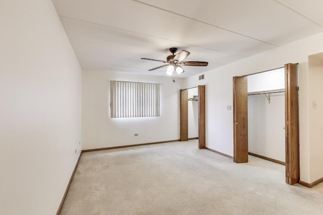 unfurnished bedroom with visible vents, carpet, ceiling fan, and baseboards