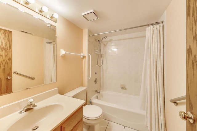 full bath with visible vents, shower / bath combo, vanity, tile patterned floors, and toilet