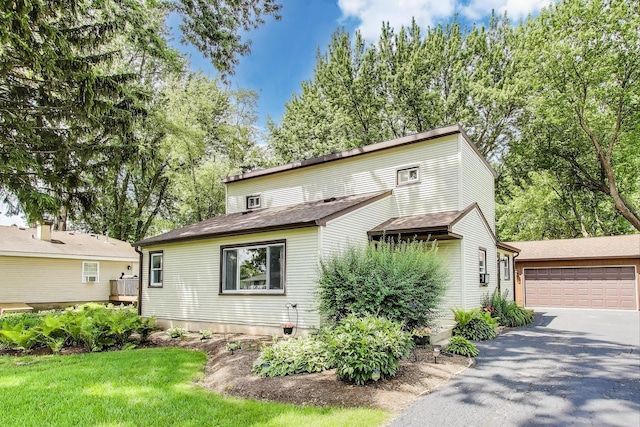 2021 Oak Dr, Mchenry, IL 60050 - view of front facade featuring a garage