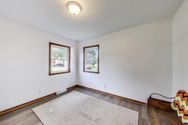 2021 Oak Dr, Mchenry, IL 60050 - unfurnished room with baseboards and wood finished floors