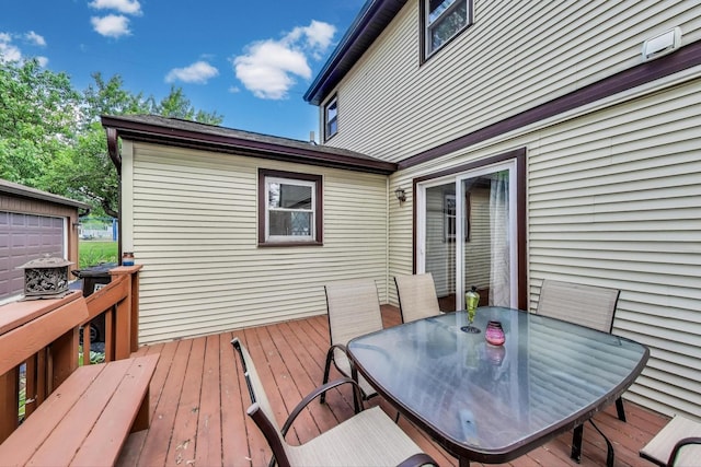 2021 Oak Dr, Mchenry, IL 60050 - wooden deck with outdoor dining area