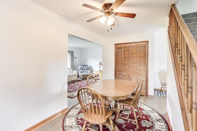 2021 Oak Dr, Mchenry, IL 60050 - dining area with ceiling fan, stairs, and light wood-style floors