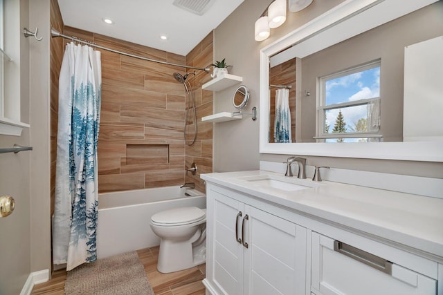 185 Wedgeport Cir, Romeoville, IL 60446 - full bath featuring toilet, wood finished floors, vanity, visible vents, and shower / bath combo