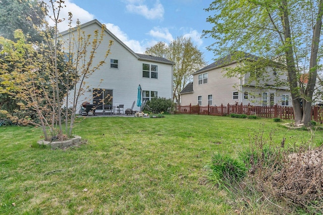 185 Wedgeport Cir, Romeoville, IL 60446 - rear view of property with a yard, a patio, and fence