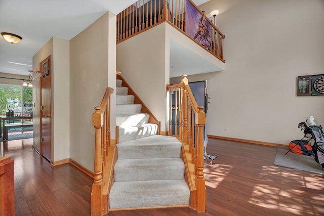 185 Wedgeport Cir, Romeoville, IL 60446 - staircase featuring baseboards and wood finished floors