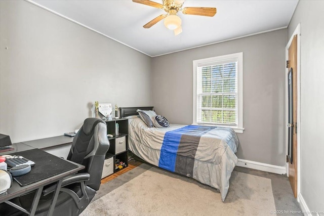bedroom with baseboards and ceiling fan