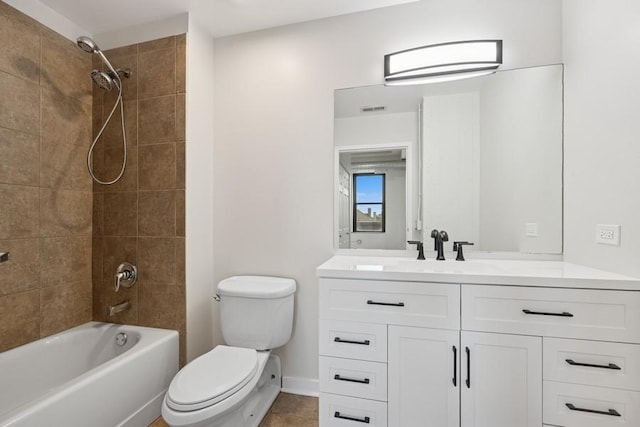 full bath with visible vents, baseboards, vanity, toilet, and bathing tub / shower combination