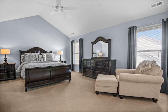 bedroom with visible vents, a ceiling fan, carpet flooring, and vaulted ceiling