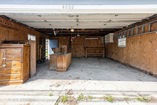 garage with wood walls