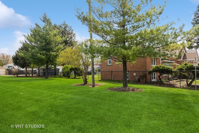 view of yard featuring fence