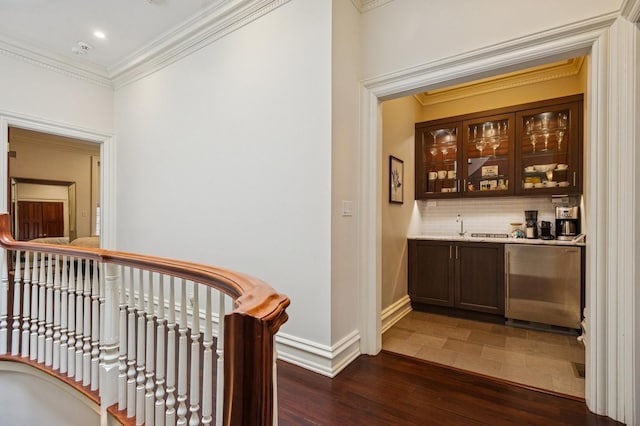1242 N Astor St, Chicago, IL 60610 - hallway with ornamental molding, baseboards, dark wood-type flooring, and an upstairs landing