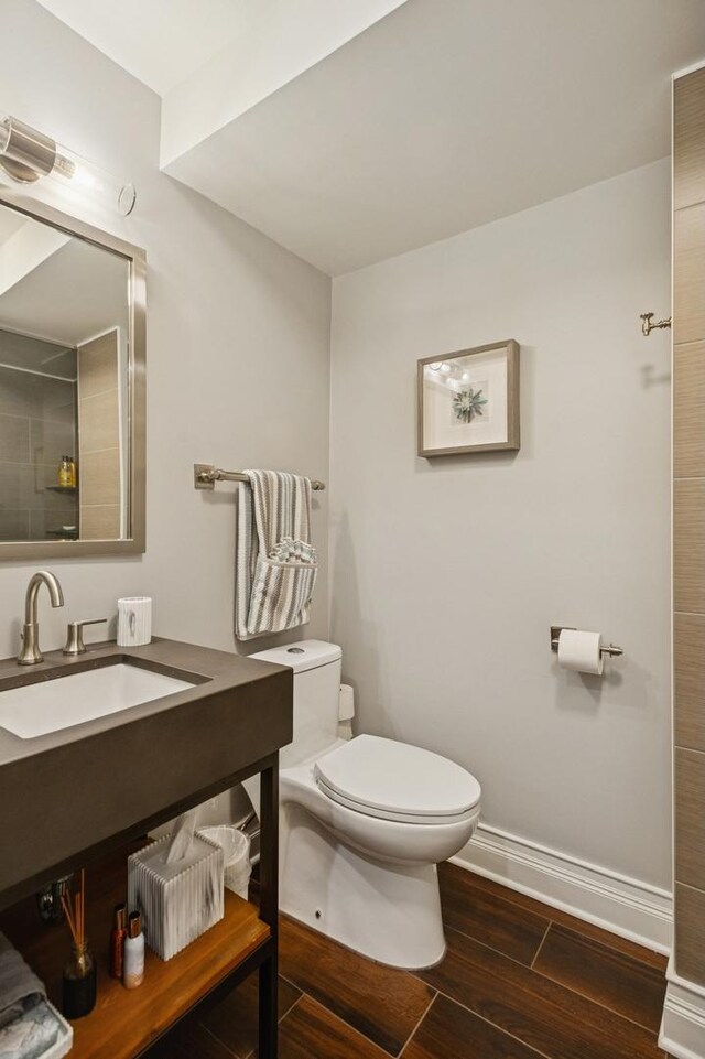 1242 N Astor St, Chicago, IL 60610 - full bathroom with toilet, wood finished floors, a sink, a shower, and baseboards