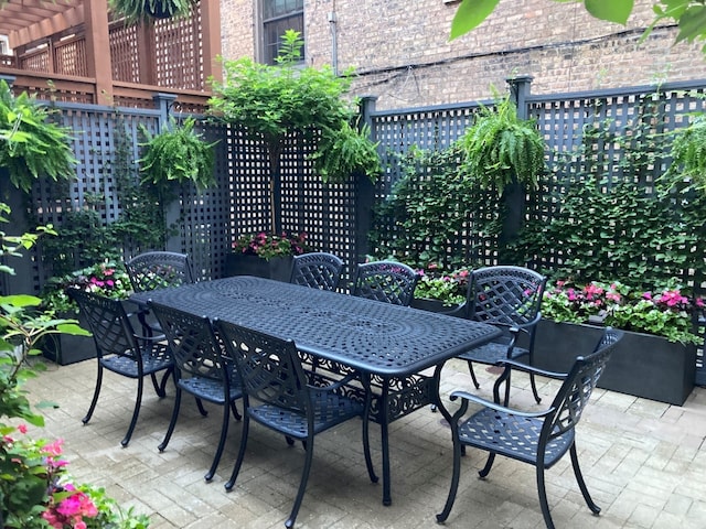 1242 N Astor St, Chicago, IL 60610 - view of patio / terrace featuring fence and outdoor dining space