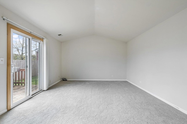1005 Thomas Blvd, Mundelein, IL 60060 - carpeted spare room featuring baseboards, visible vents, and lofted ceiling