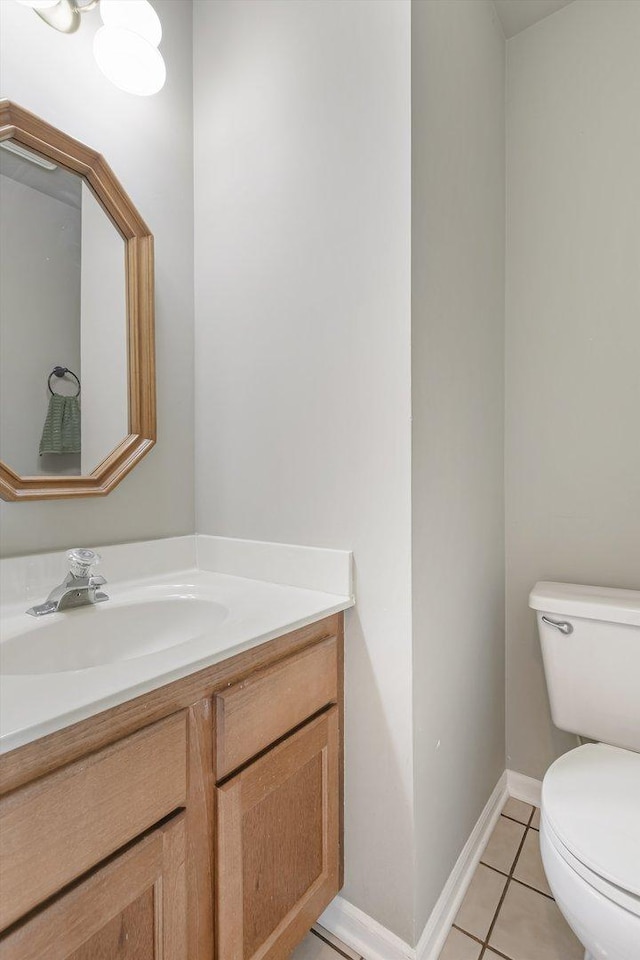 1005 Thomas Blvd, Mundelein, IL 60060 - bathroom featuring vanity, baseboards, tile patterned floors, and toilet