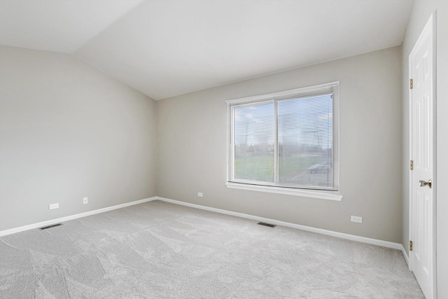 1005 Thomas Blvd, Mundelein, IL 60060 - unfurnished room with baseboards, light colored carpet, and visible vents