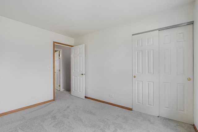 1005 Thomas Blvd, Mundelein, IL 60060 - unfurnished bedroom featuring baseboards, carpet, and a closet