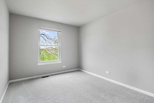 1005 Thomas Blvd, Mundelein, IL 60060 - carpeted empty room with baseboards and visible vents