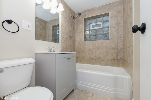 bathroom with tile patterned floors, vanity, toilet, and bathtub / shower combination